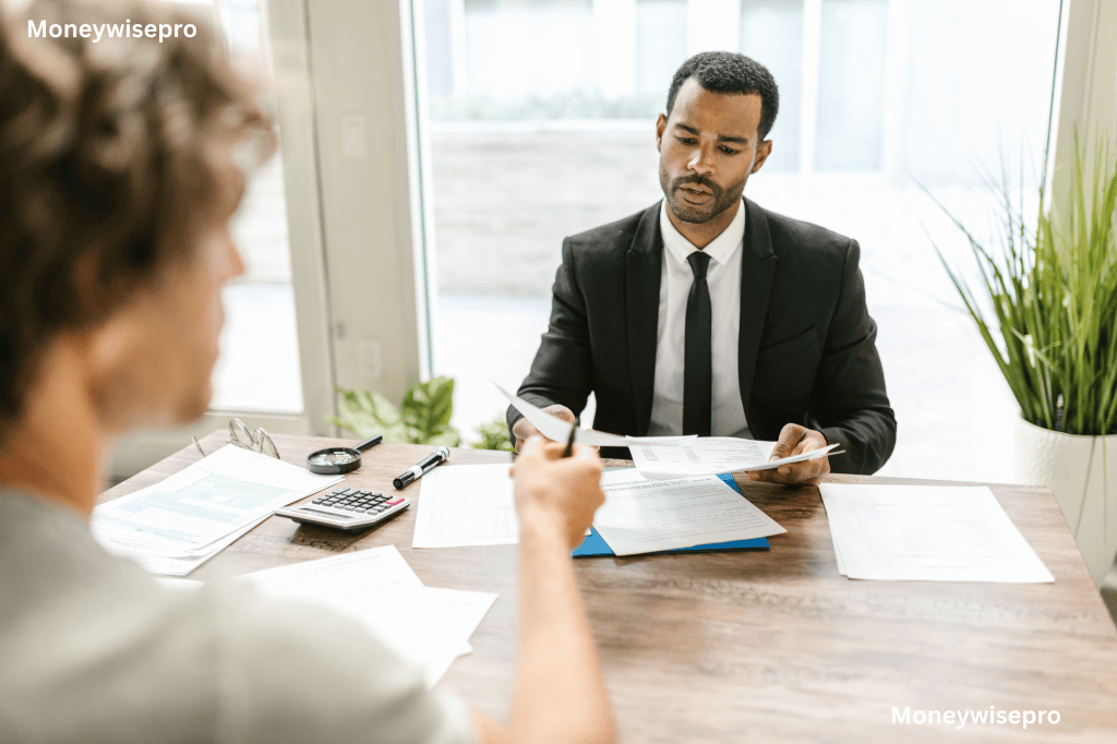 Person having a conversation with a landlord or property manager about lease terms