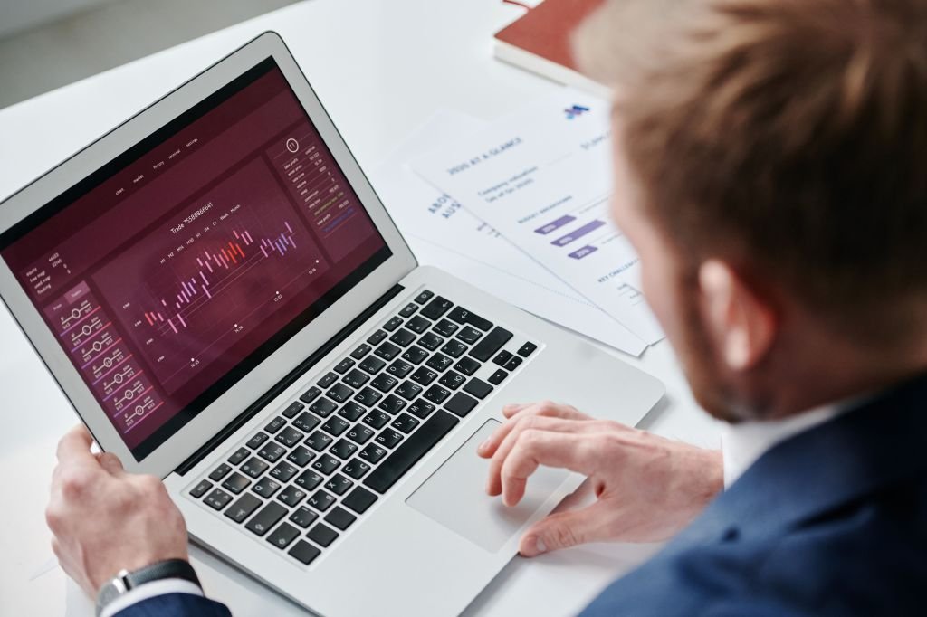 Person checking their credit score on a laptop screen